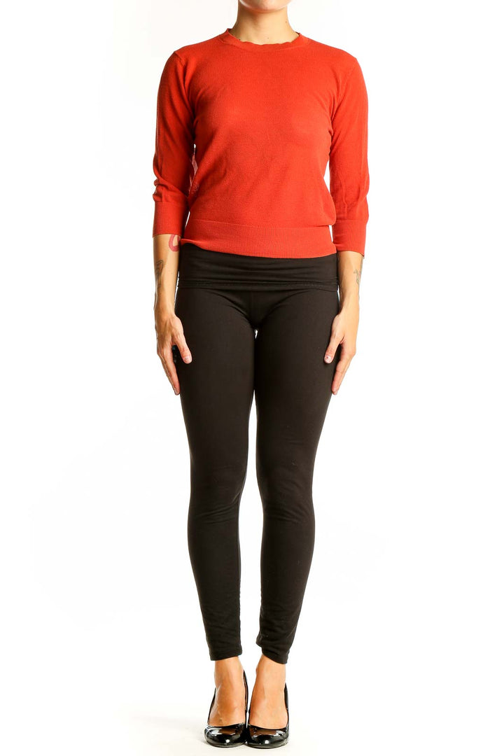 Front view of red Vince cotton crew neck sweater with 3/4 sleeves