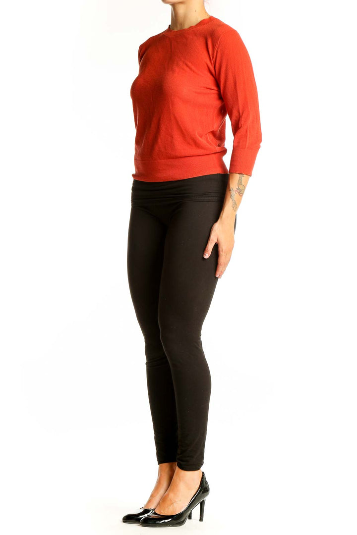 Front view of red Vince cotton crew neck sweater with 3/4 sleeves
