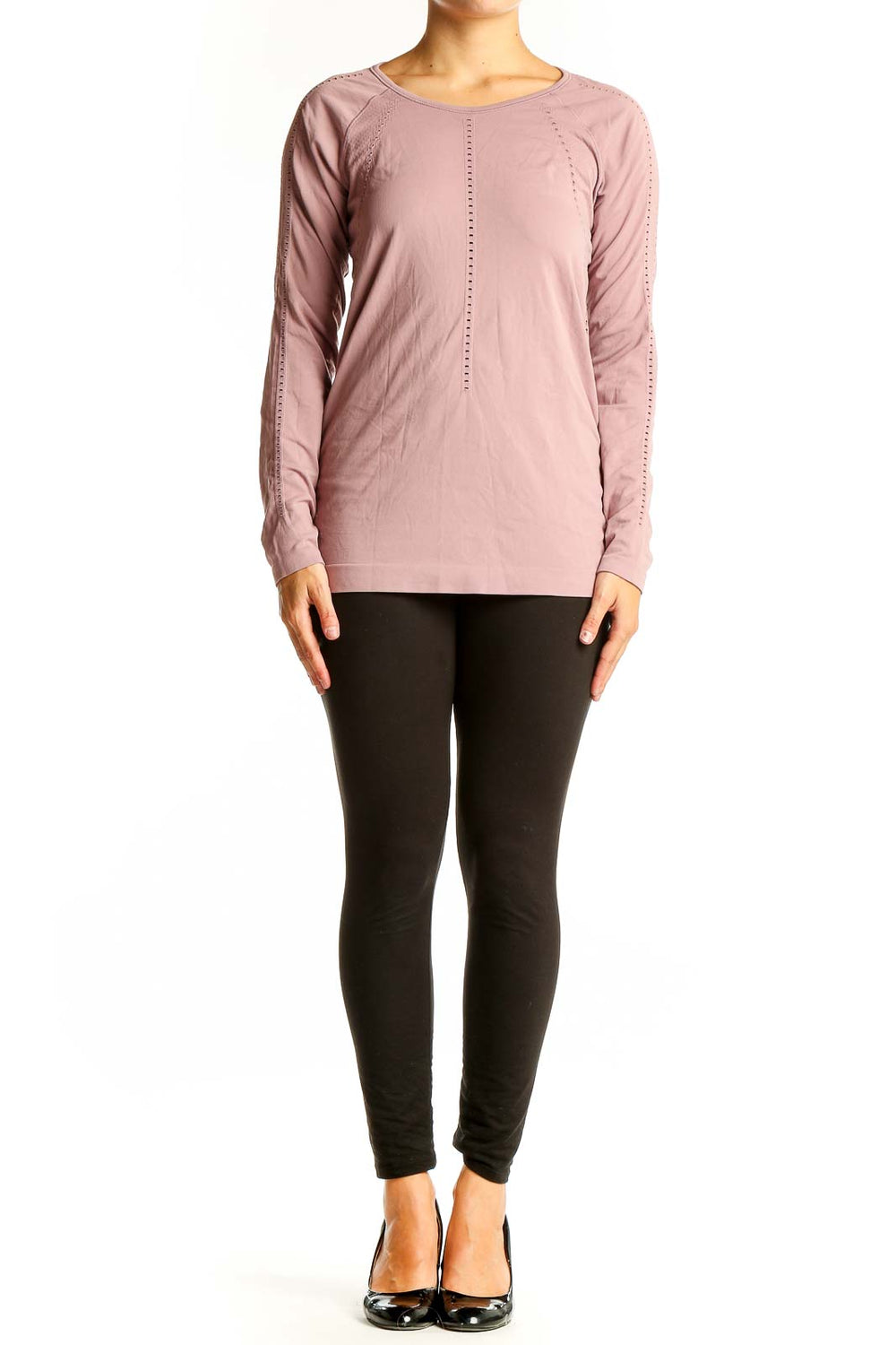 Front view of pink Athleta long sleeve performance top with perforated detailing