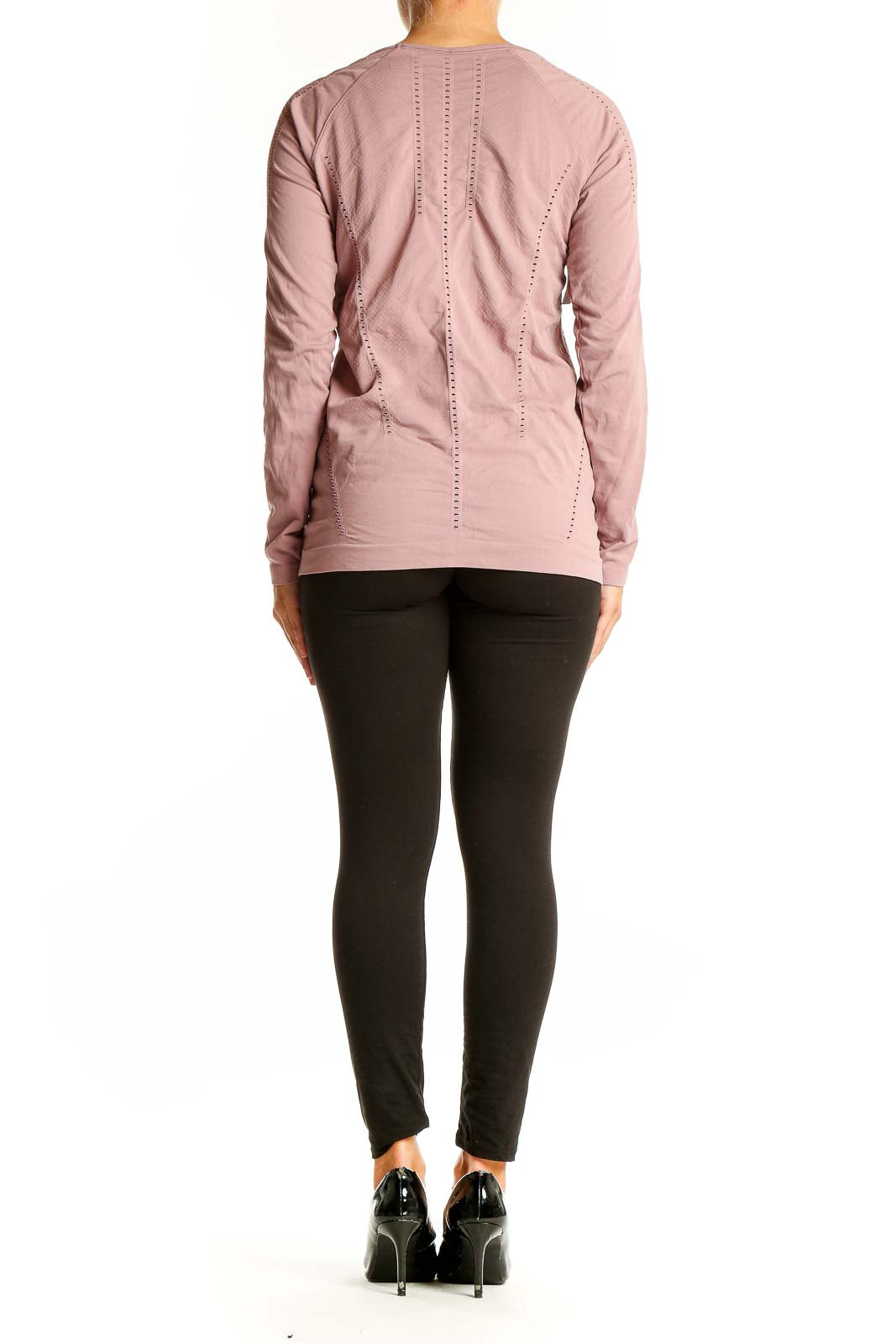 Back view of pink Athleta long sleeve performance top showing raglan sleeves