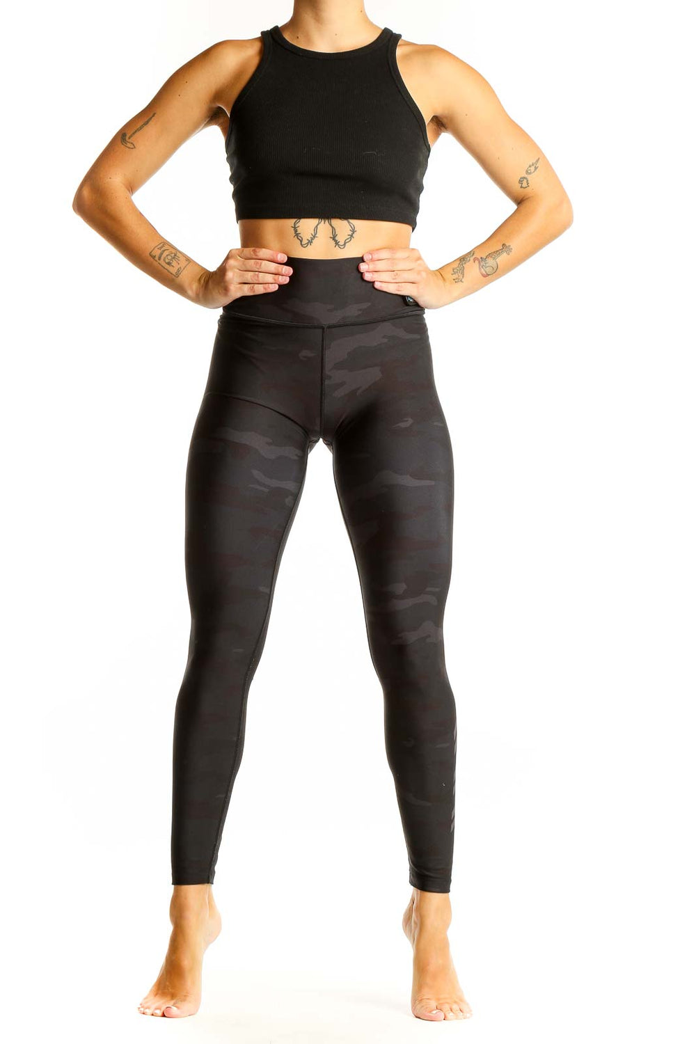 Front view of Barrys black camo high-waisted leggings on model