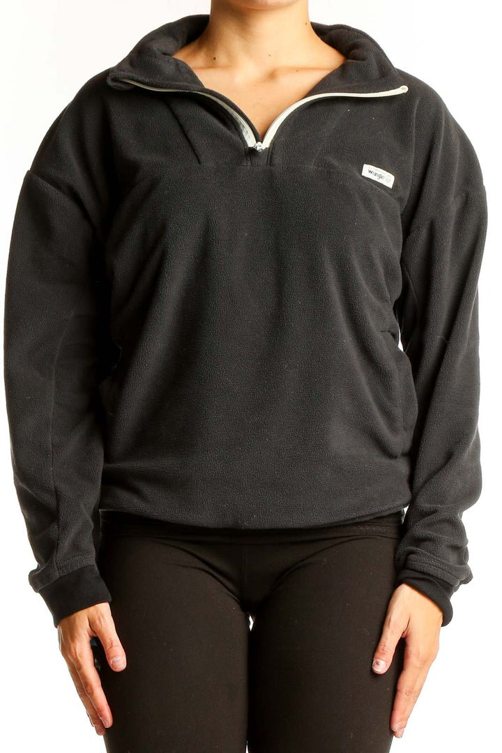 Front view of black Wrangler half-zip fleece pullover