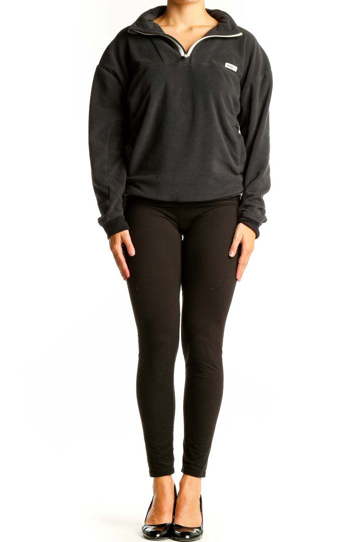 Front view of black Wrangler half-zip fleece pullover