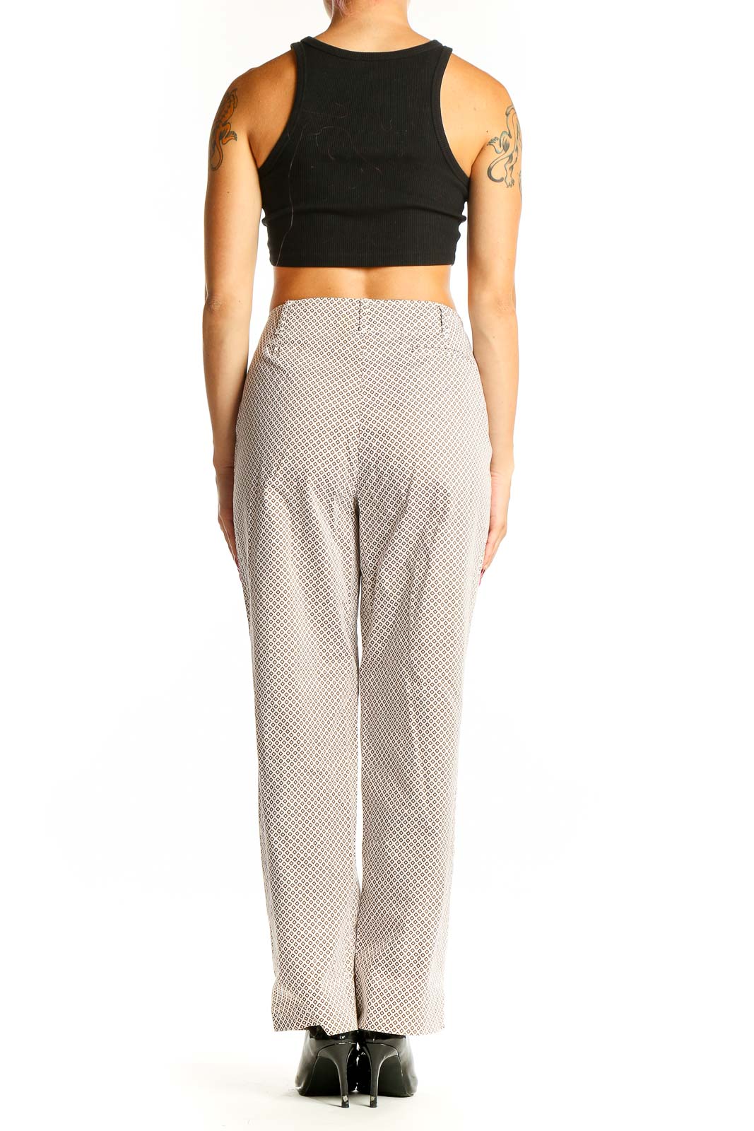 Side view of model wearing beige Talbots trousers with black top