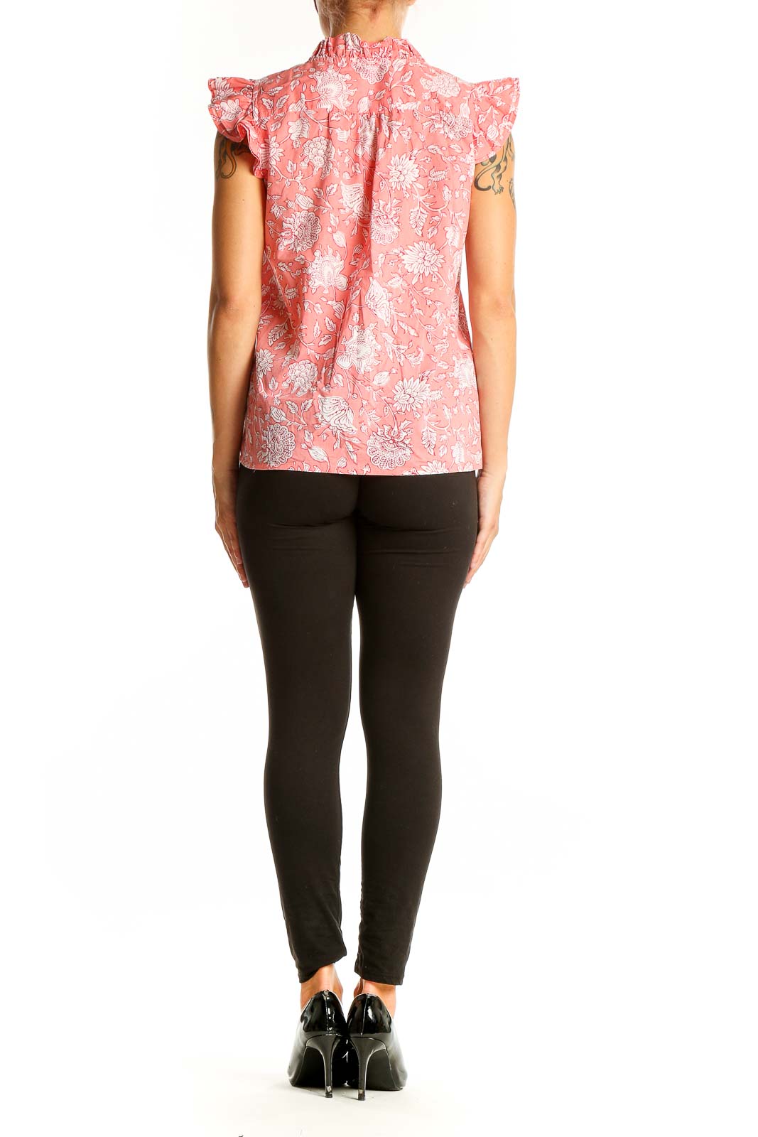 Side view of J.Crew pink floral cotton top showing ruffle sleeve detail