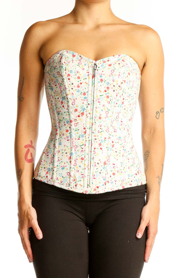 Front view of white floral cotton corset top with sweetheart neckline