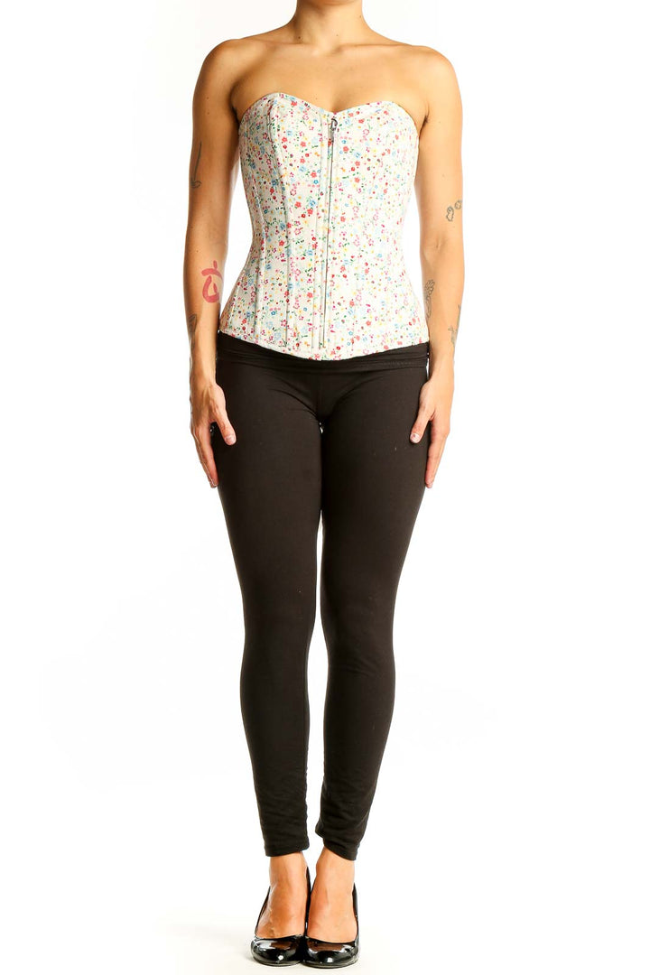 Front view of white floral cotton corset top with sweetheart neckline