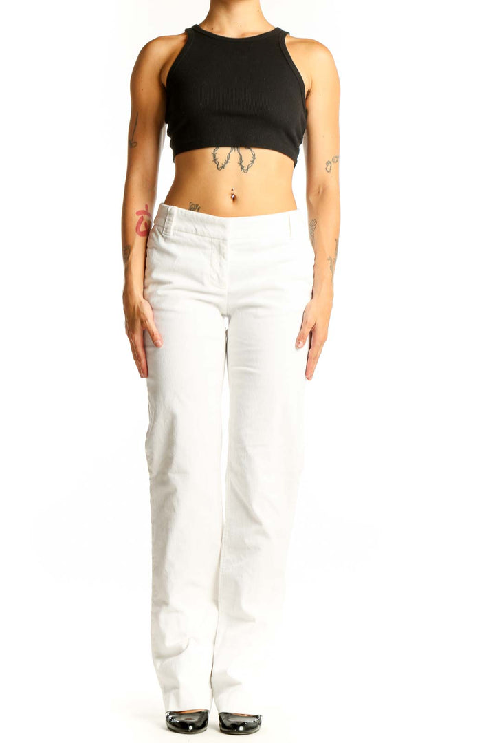 Front view of J.Crew white straight leg pants on model