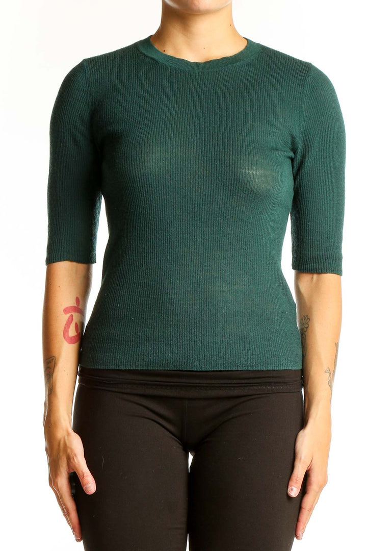 Front view of green ribbed wool Vince sweater with crewneck and elbow-length sleeves