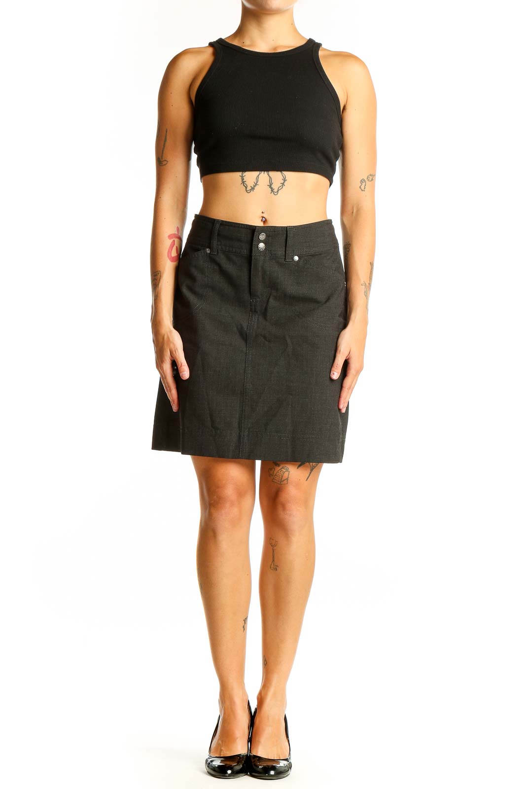 Front view of Athleta black A-line skirt with button detail