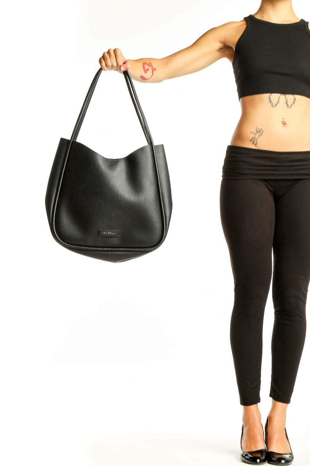 Front view of NEWBELLA black leather hobo tote bag