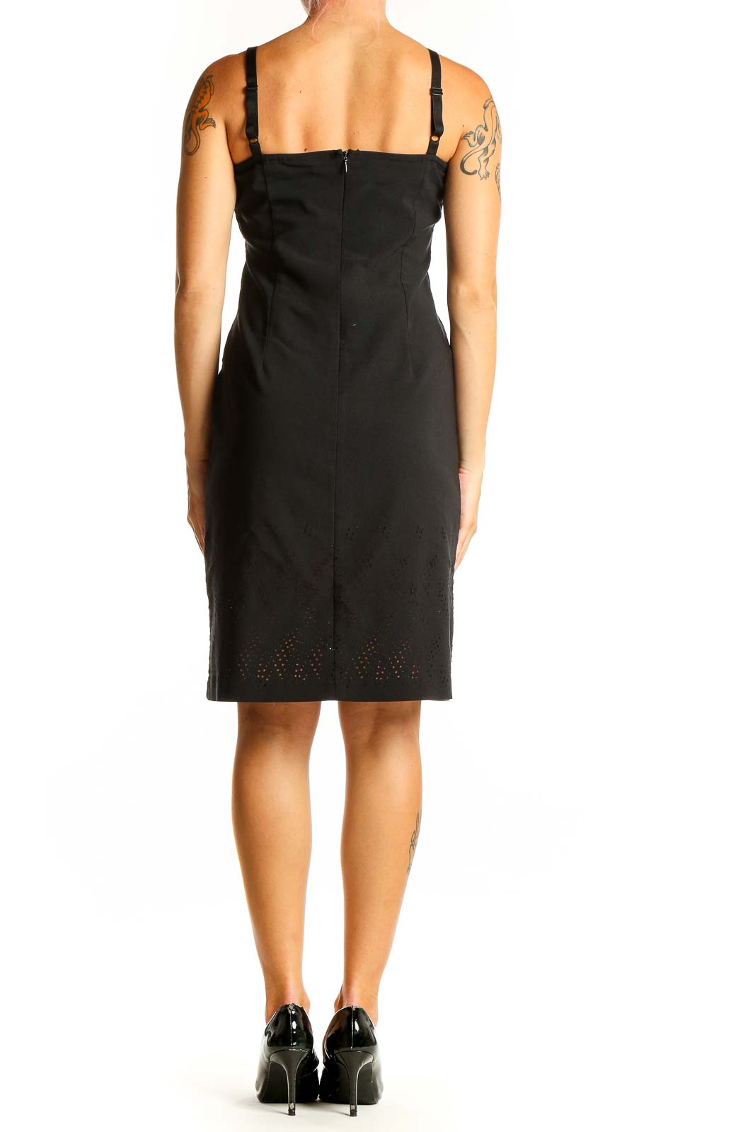 Side view of Cynthia Steffe black sheath dress showing fitted silhouette and eyelet hem detail