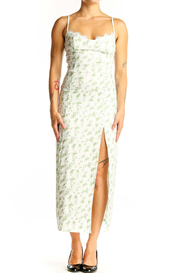 Front view of white floral print maxi dress with lace-trimmed sweetheart neckline