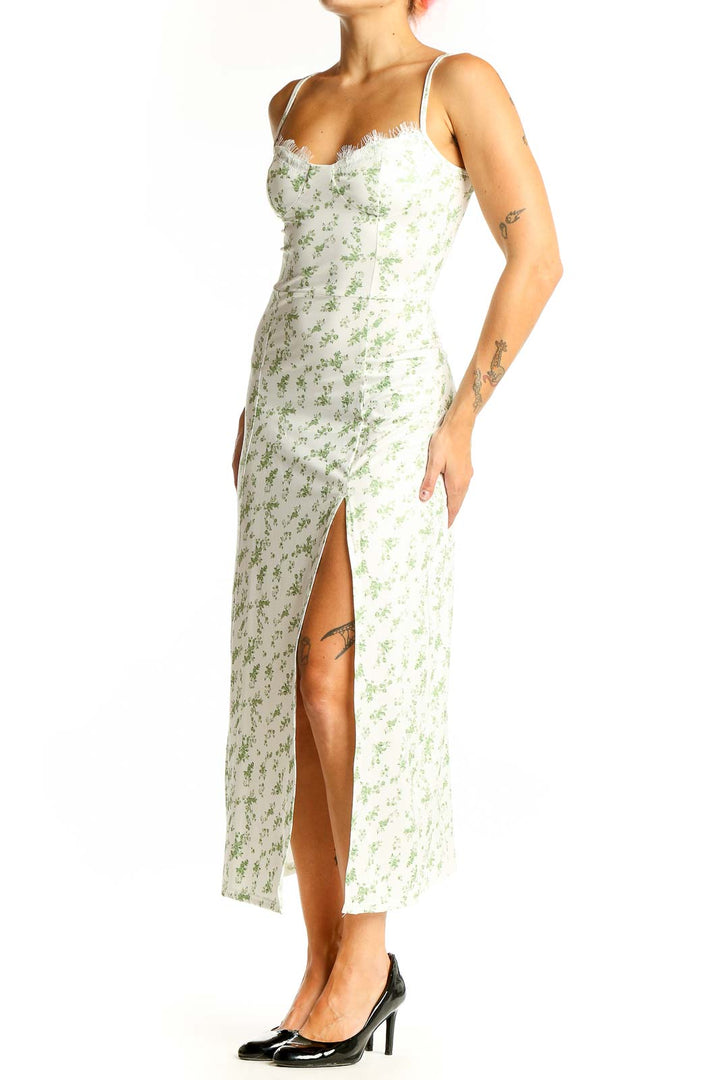 Front view of white floral print maxi dress with lace-trimmed sweetheart neckline
