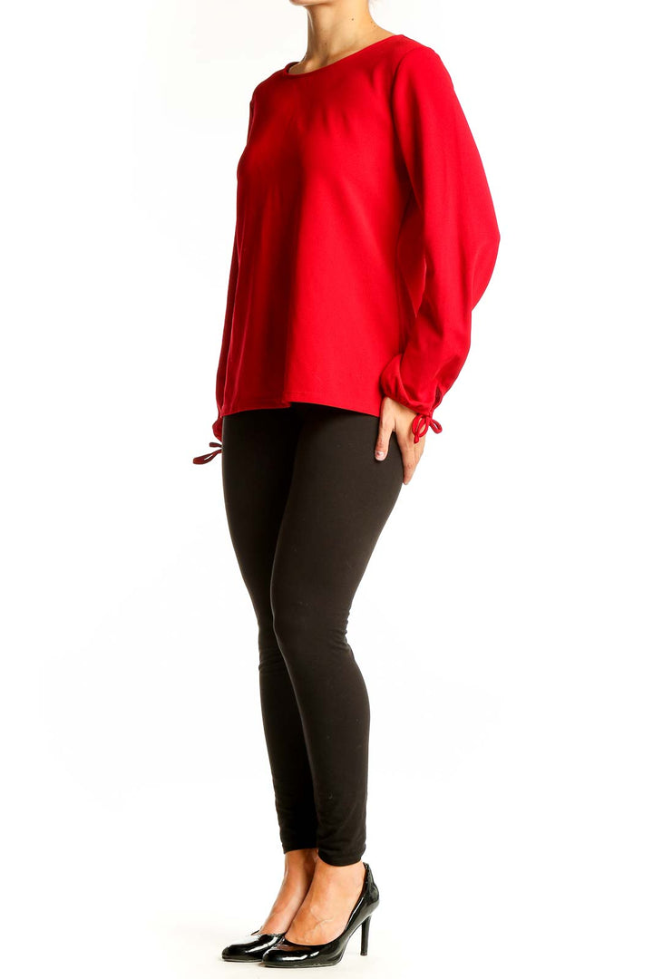 Front view of red Talbots long sleeve blouse with boat neckline