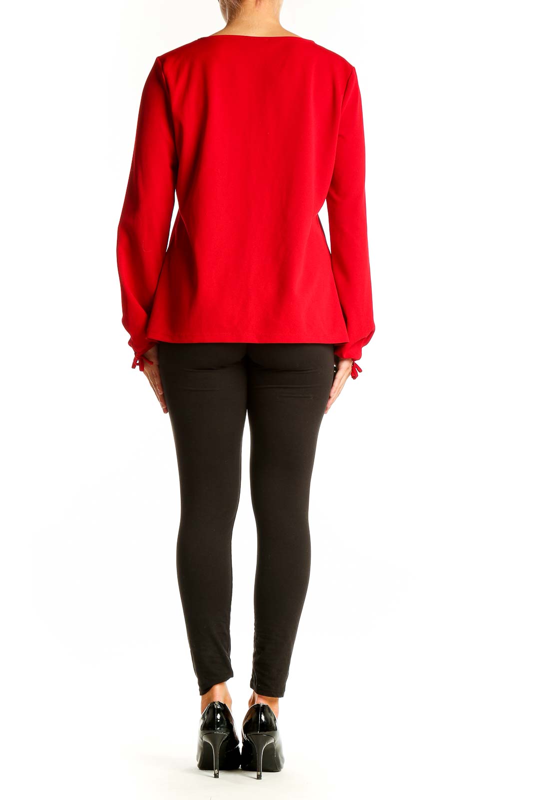 Side view of red Talbots long sleeve blouse showing tie cuff detail
