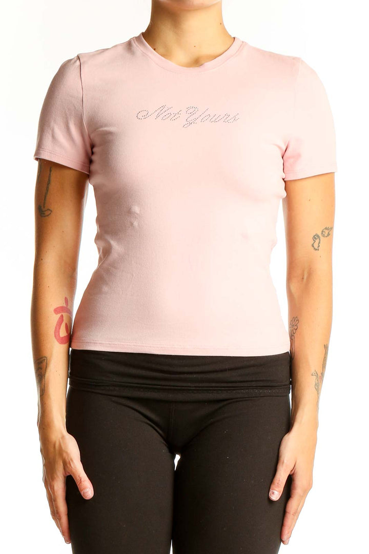 Front view of Pink Victoria's Secret fitted t-shirt in light pink with subtle logo embroidery