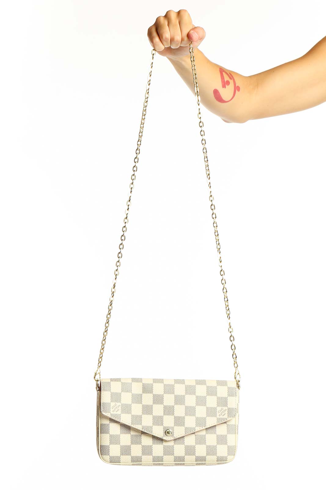 Front view of Louis Vuitton white checkered canvas crossbody bag with gold chain