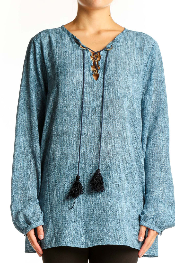 Front view of Michael Kors blue chambray tunic top with lace-up neckline