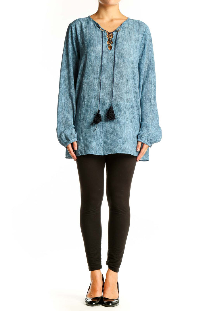 Front view of Michael Kors blue chambray tunic top with lace-up neckline
