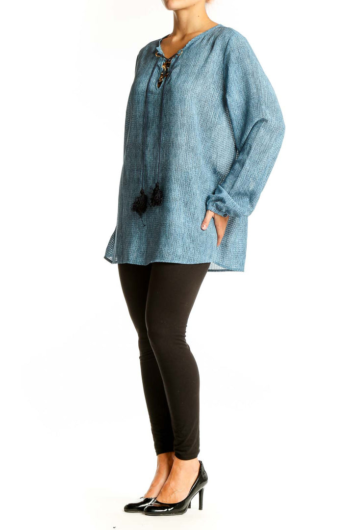 Front view of Michael Kors blue chambray tunic top with lace-up neckline