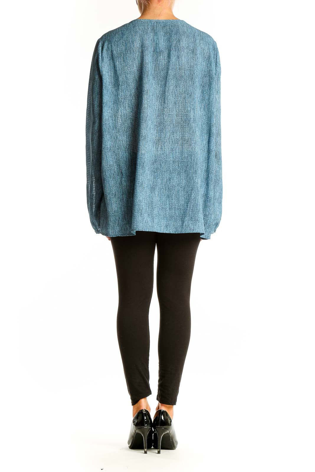 Side view of Michael Kors blue chambray tunic top showing flowy silhouette