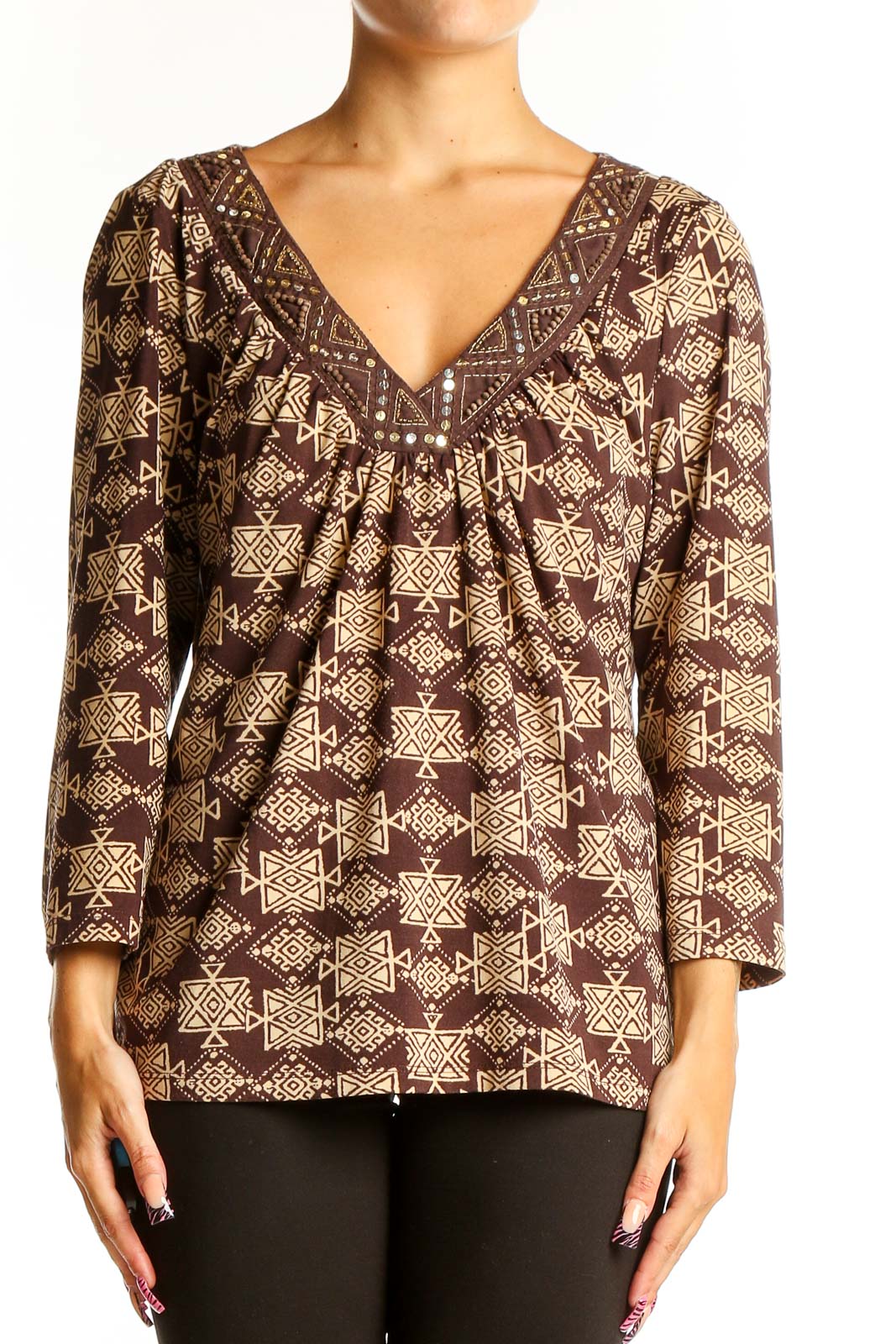 Front view of INC brown geometric print V-neck blouse with 3/4 sleeves
