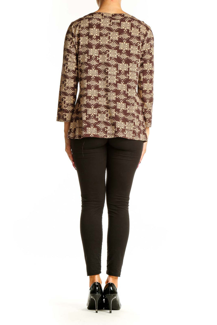 Back view of INC brown geometric print blouse showing relaxed fit