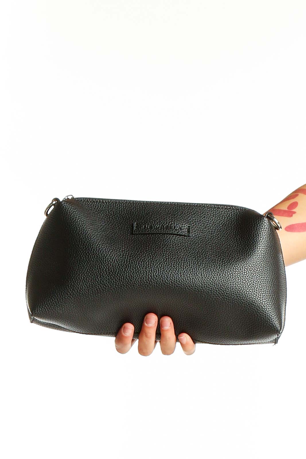 Front view of black leather NEWBELLA clutch purse held in hand
