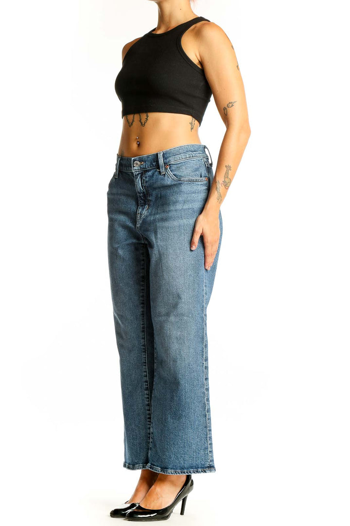 Front view of Gap blue wide-leg jeans on model