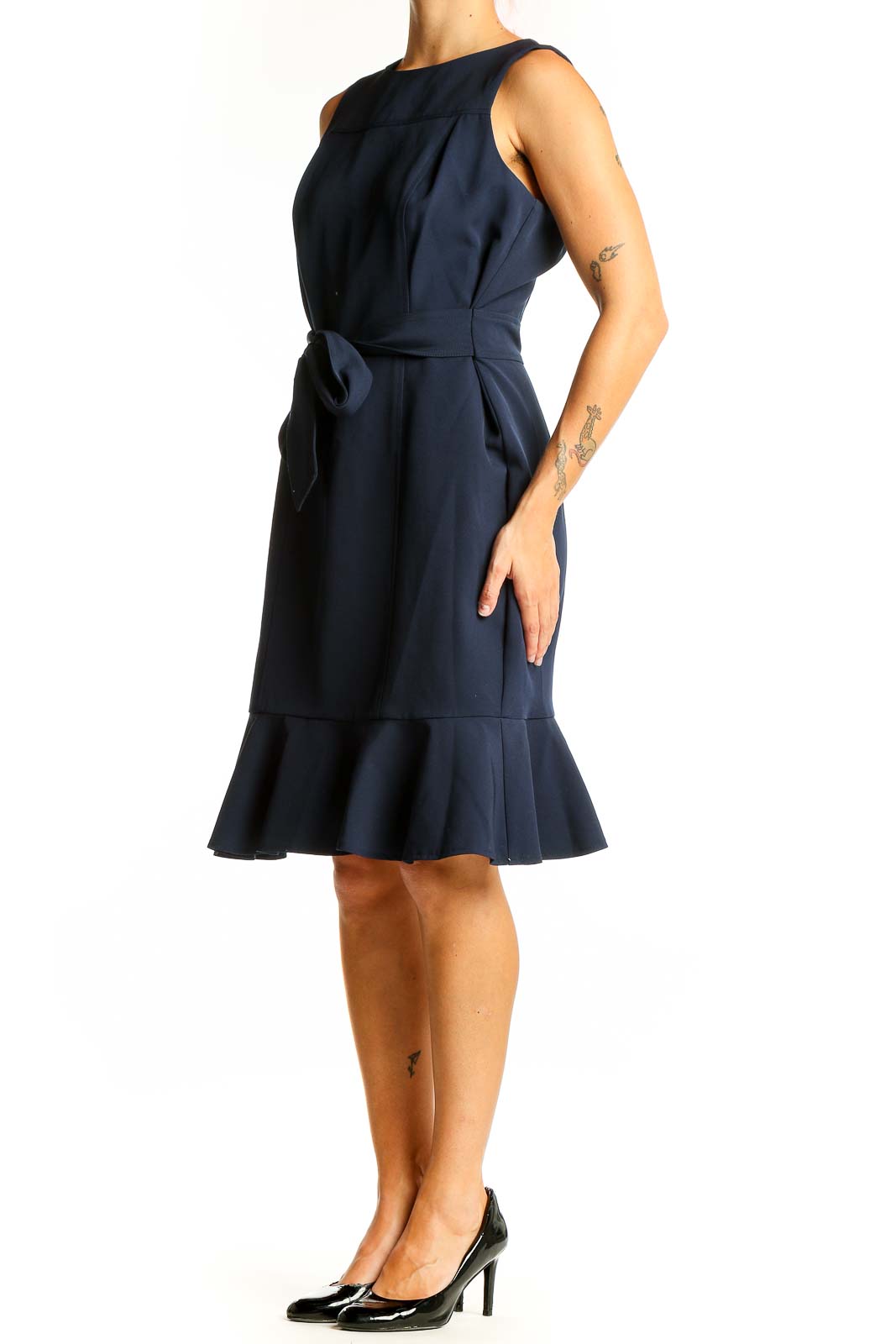 Front view of London Times navy sleeveless dress with flounce hem and waist tie