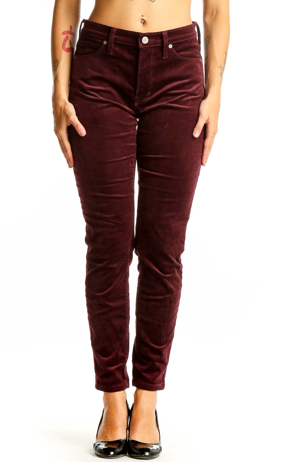 Front view of Banana Republic burgundy velvet slim-fit pants on model