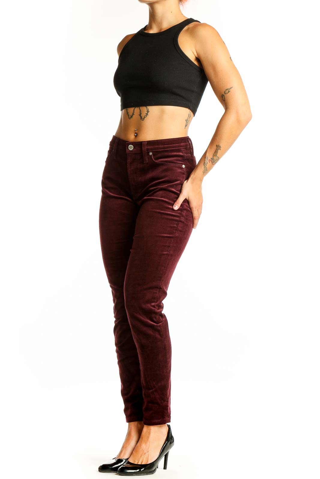 Front view of Banana Republic burgundy velvet slim-fit pants on model