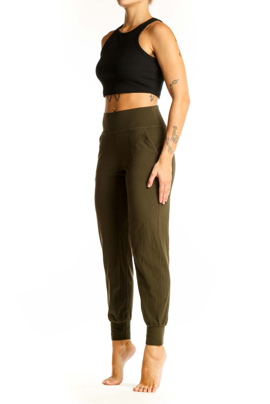 Front view of olive green Lululemon spandex jogger pants