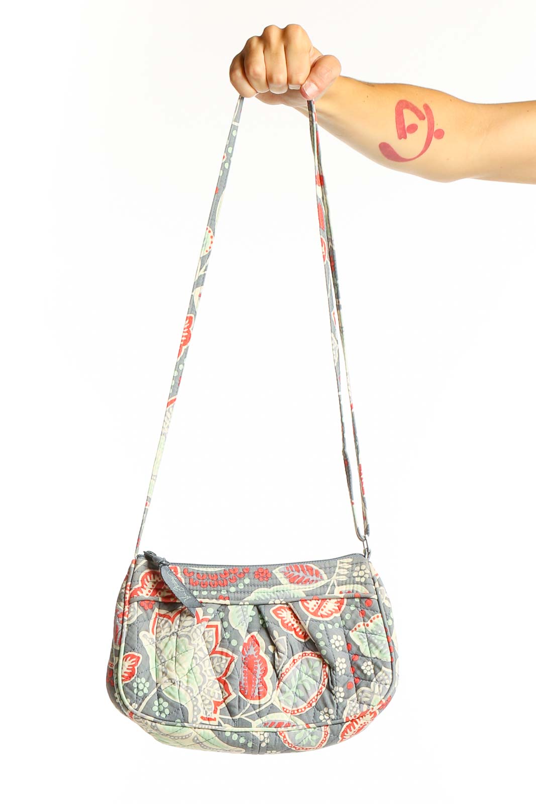 Front view of Vera Bradley gray floral print crossbody bag with coral and mint accents