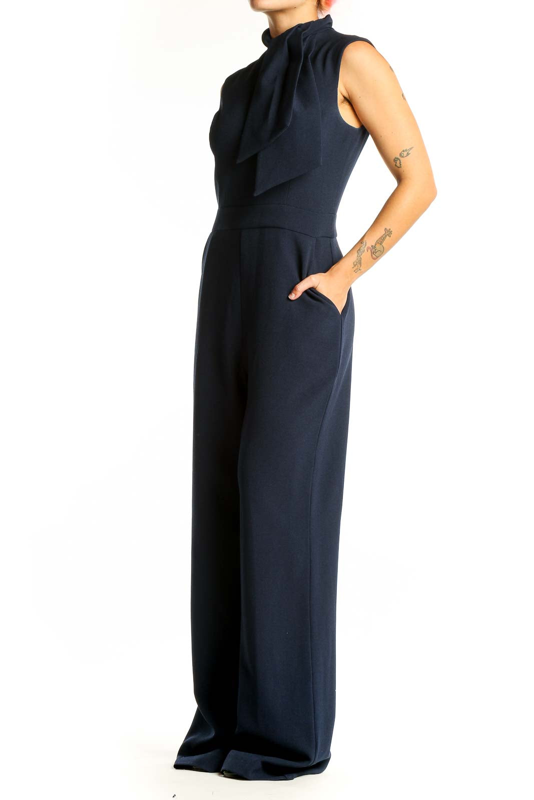 Front view of Harper Rose navy sleeveless jumpsuit with draped neck detail