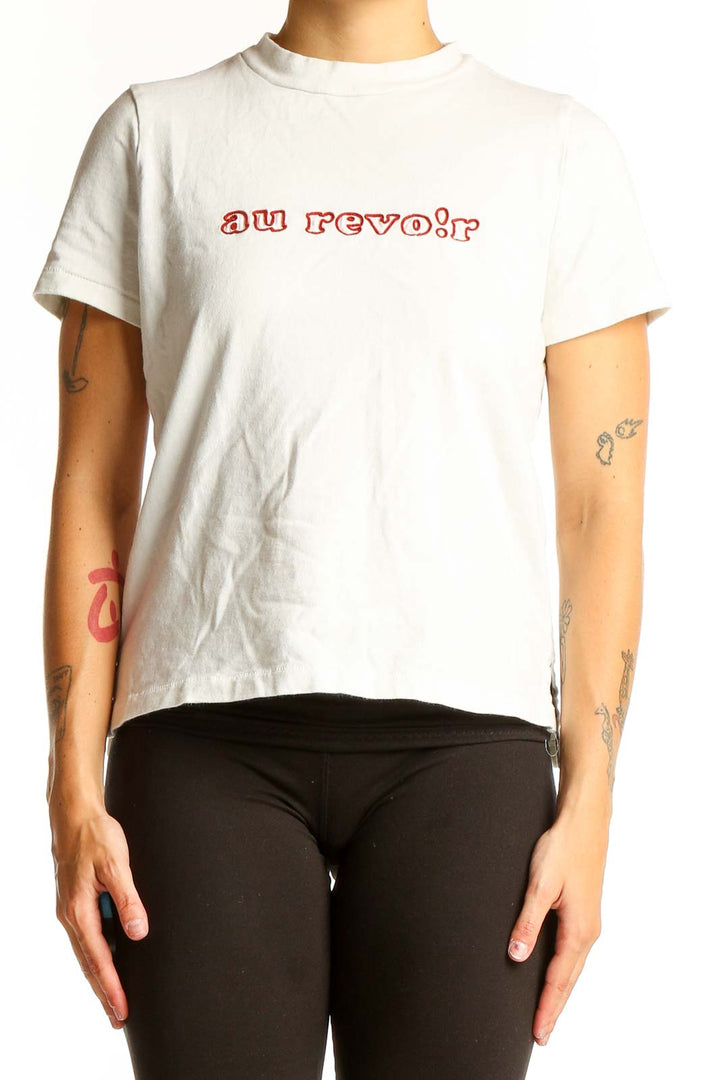Front view of white Madewell t-shirt with red 'au revoir' graphic print