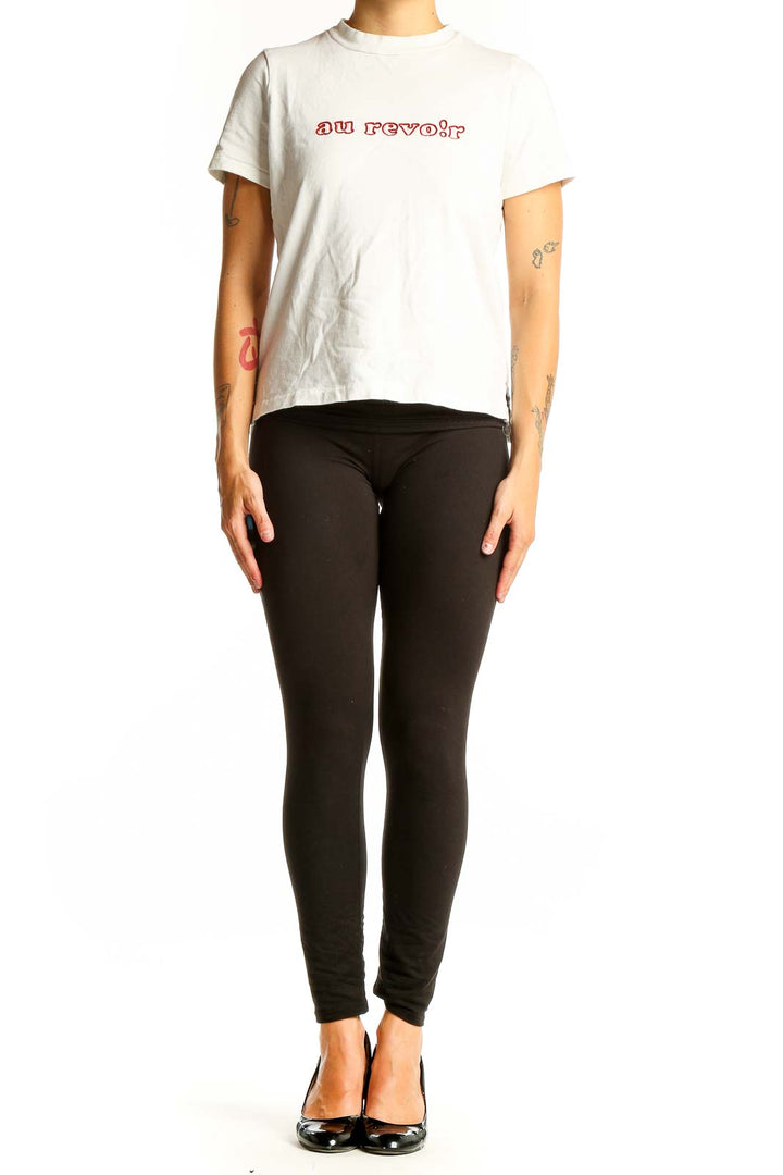 Front view of white Madewell t-shirt with red 'au revoir' graphic print