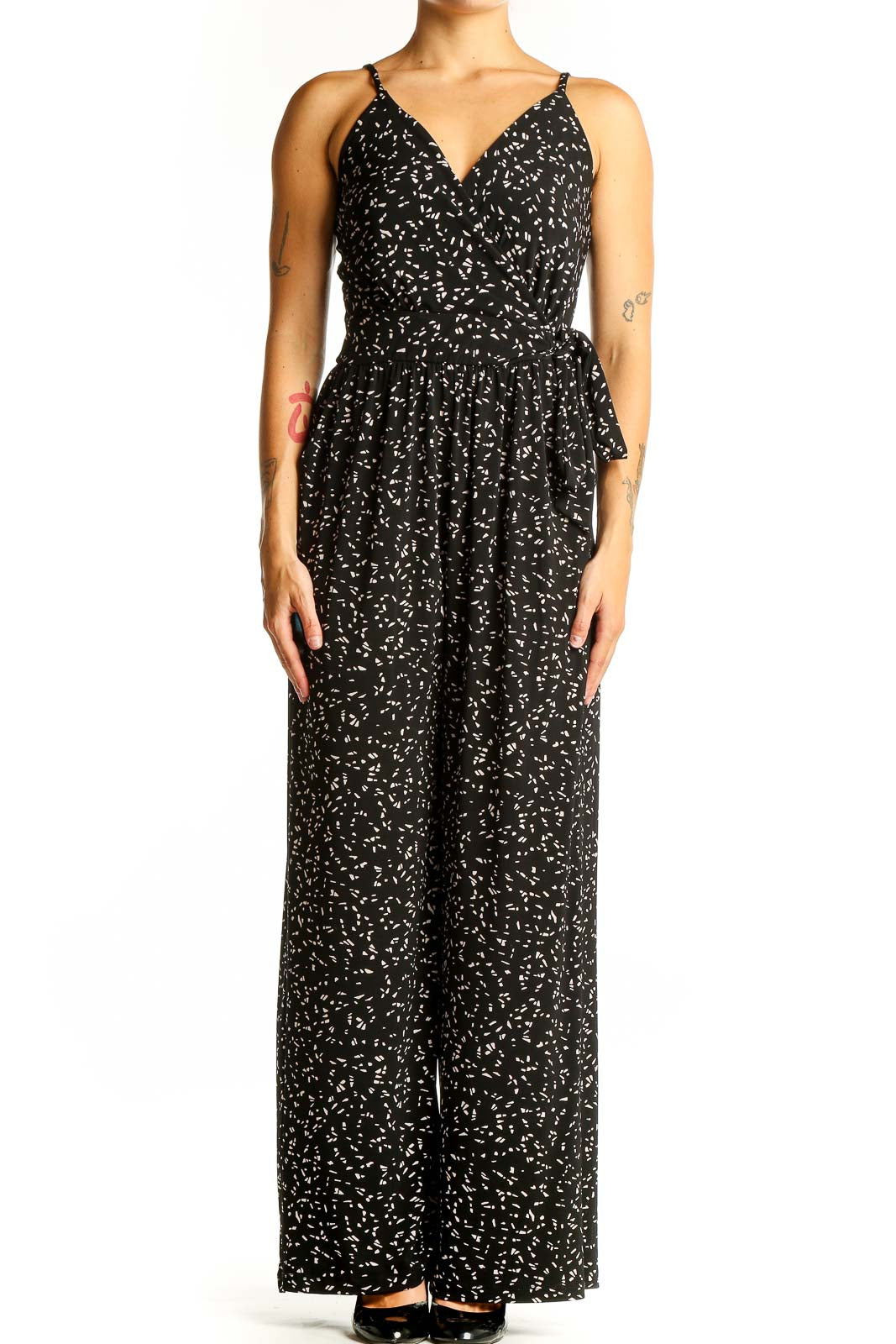Front view of Kaileigh black floral print jumpsuit with V-neck and wide-leg design