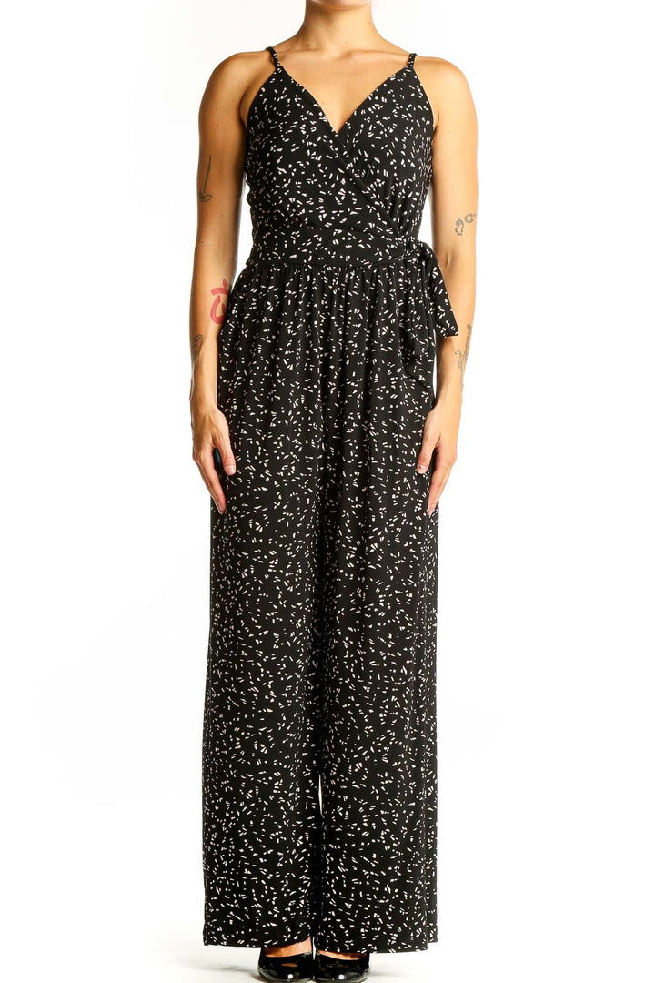 Front view of Kaileigh black floral print jumpsuit with V-neck and wide-leg design