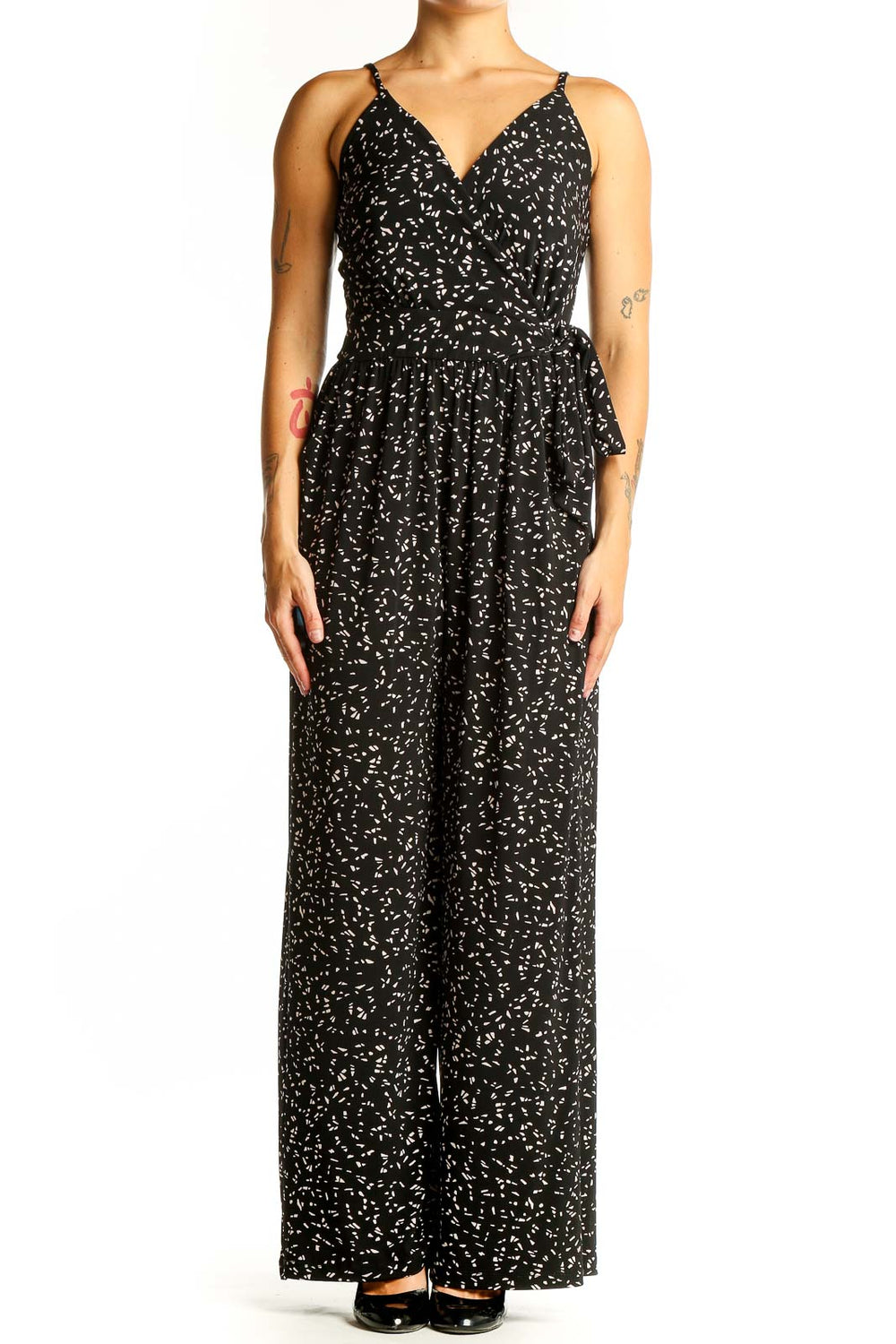 Front view of Kaileigh black floral print jumpsuit with V-neck and wide-leg design