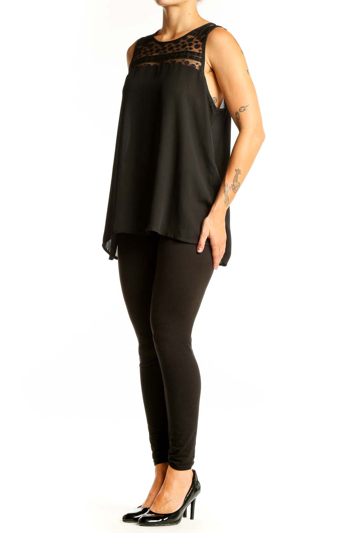 Front view of Papermoon Black Sleeveless Top with Polka Dot Mesh Panel