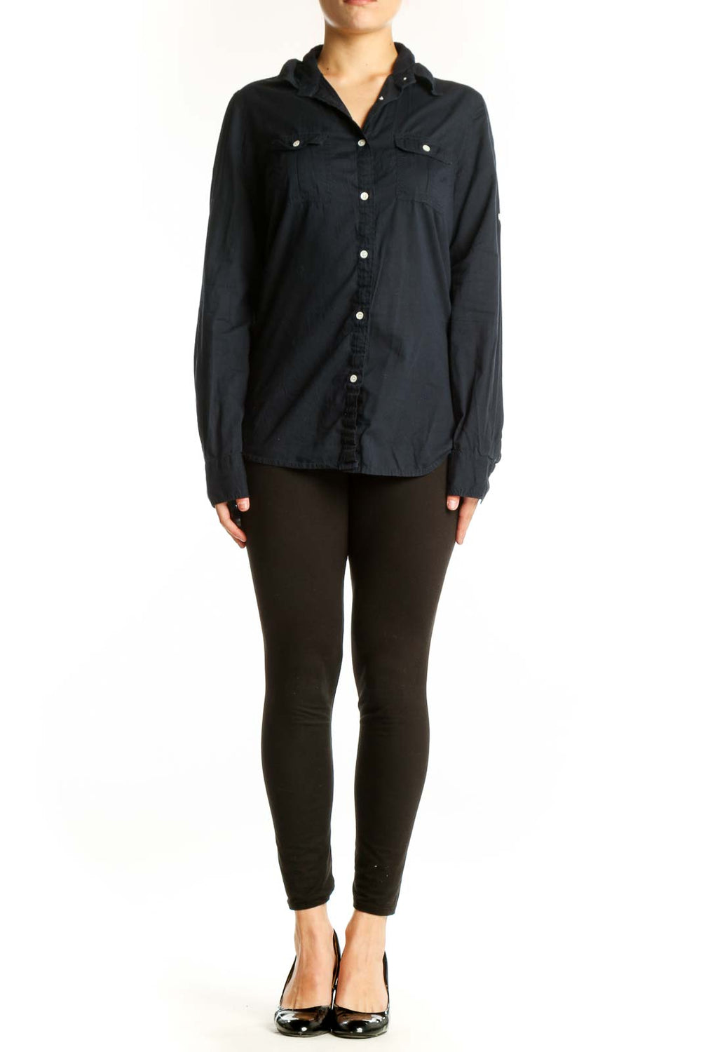 Navy cotton button-up shirt with pearl buttons and chest pockets, front view on model