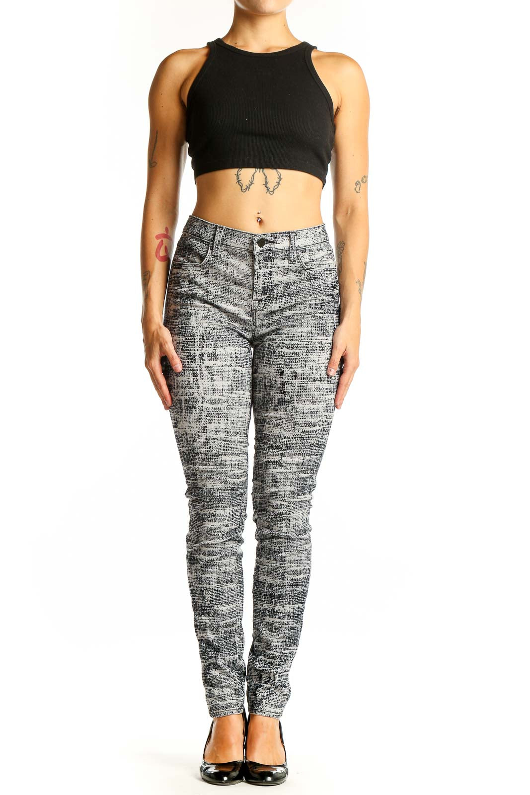 Front view of J Brand gray textured skinny jeans with unique woven pattern