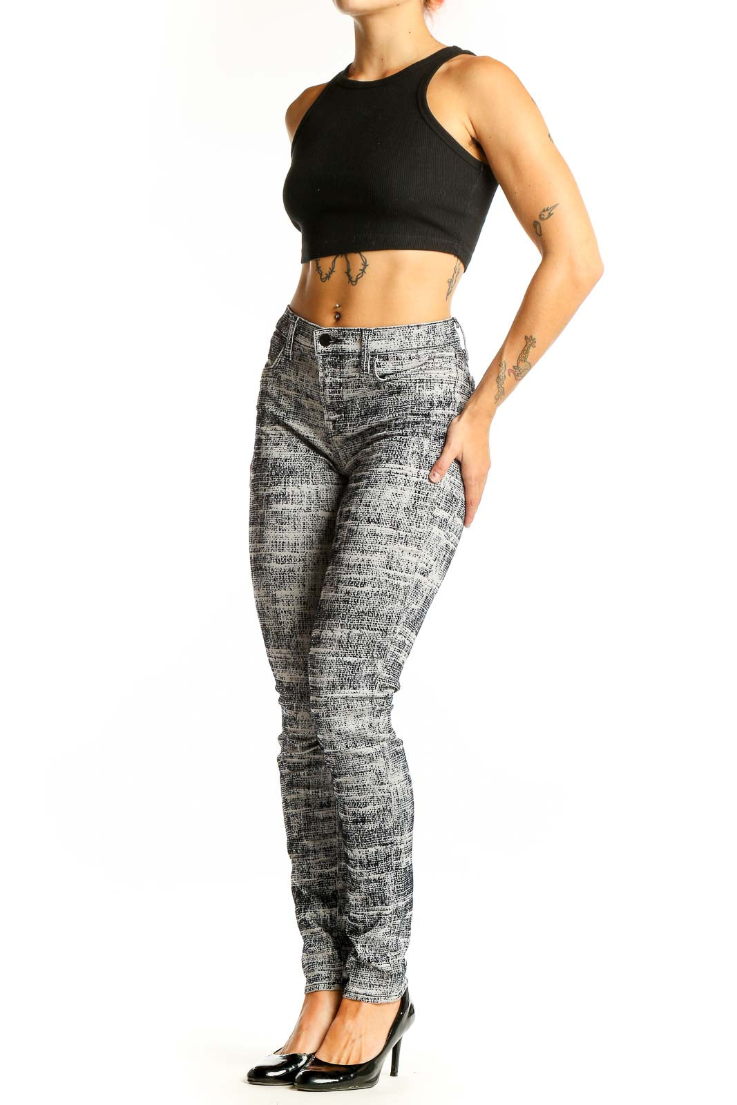 Front view of J Brand gray textured skinny jeans with unique woven pattern