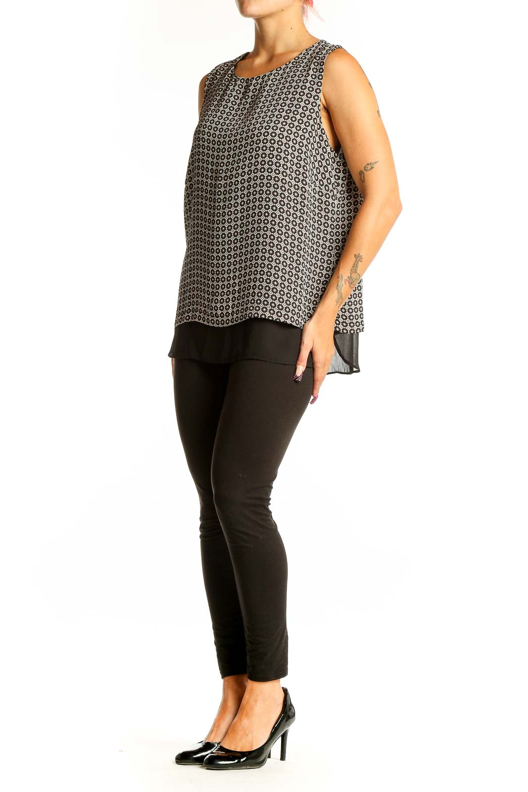 Front view of Rose + Olive black and white geometric print sleeveless top