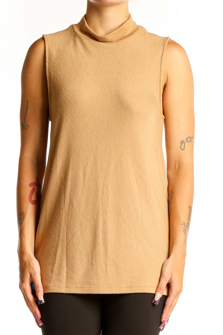 Front view of camel sleeveless mock neck top from Banana Republic