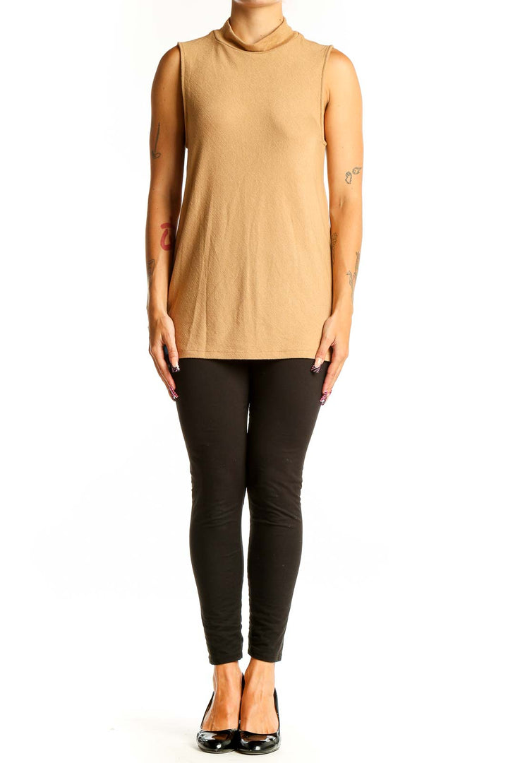 Front view of camel sleeveless mock neck top from Banana Republic