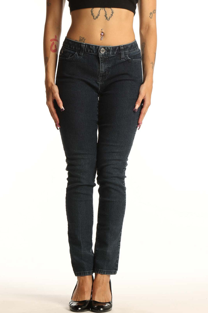 Front view of Michael Kors dark blue slim-fit jeans on model