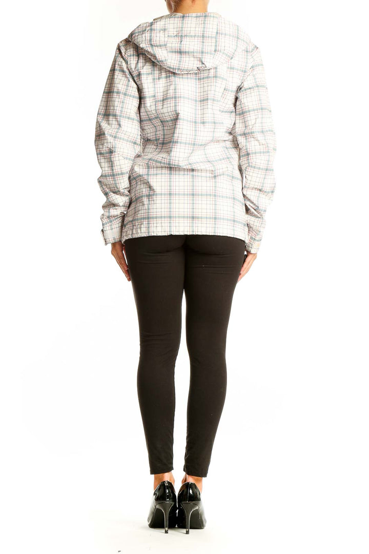 Side view of white plaid Burton polyester hooded jacket on model